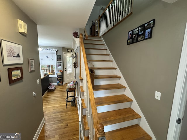 509 White Pine Cir, Demorest, GA 30535 - staircase with baseboards and wood finished floors