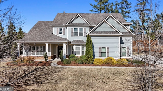 240 Sturry Dr, Mcdonough, GA 30252 - view of front of house featuring a shingled roof and covered porch