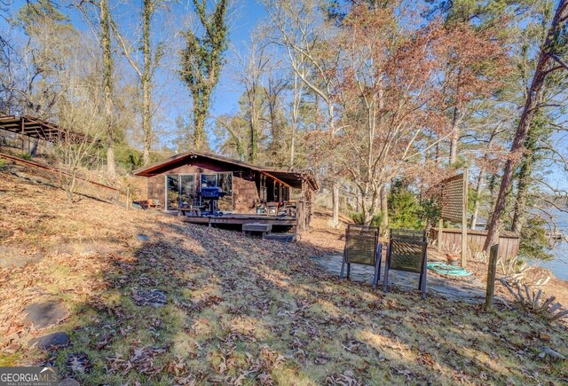 126 Shannon Way, Jackson, GA 30233 - view of yard with a deck