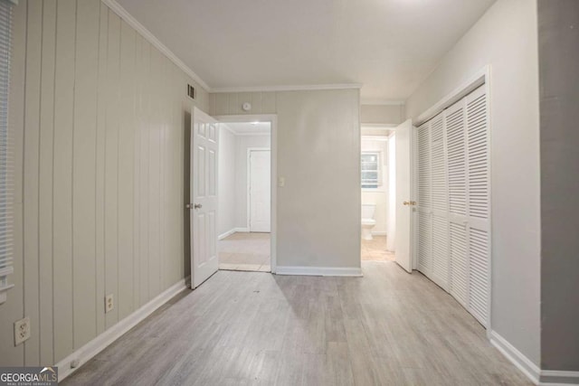 2046 Rector Dr SW, Atlanta, GA 30311 - unfurnished bedroom featuring wood finished floors, a closet, and crown molding