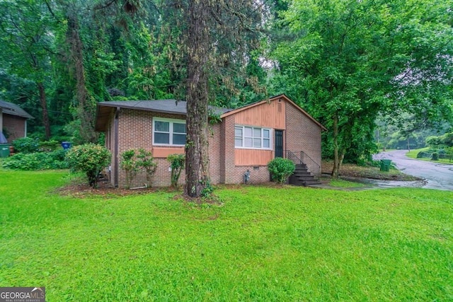 2046 Rector Dr SW, Atlanta, GA 30311 - view of front of house with brick siding and a front lawn