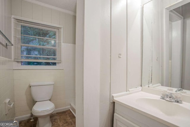2046 Rector Dr SW, Atlanta, GA 30311 - bathroom featuring vanity, ornamental molding, and tile walls