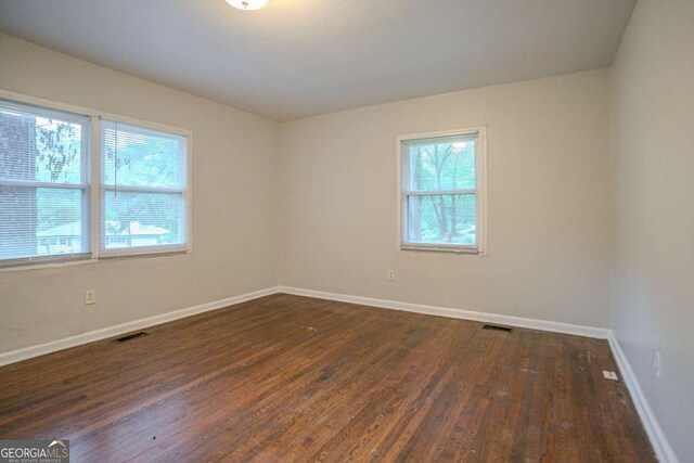 2046 Rector Dr SW, Atlanta, GA 30311 - unfurnished room featuring wood finished floors and baseboards