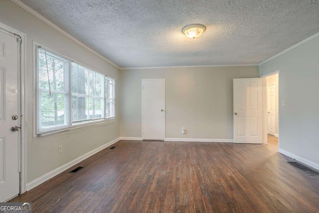 2046 Rector Dr SW, Atlanta, GA 30311 - empty room featuring dark wood finished floors, a textured ceiling, and ornamental molding