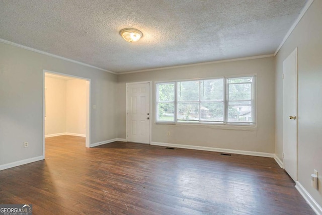 2046 Rector Dr SW, Atlanta, GA 30311 - empty room with crown molding, dark wood finished floors, and a textured ceiling