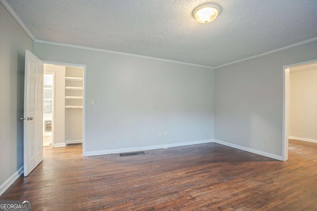 2046 Rector Dr SW, Atlanta, GA 30311 - empty room with wood finished floors, ornamental molding, and a textured ceiling