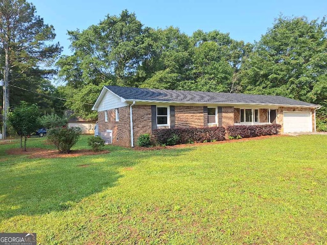 1261 Glenn Carrie Rd, Hull, GA 30646 - single story home featuring an attached garage, brick siding, a front yard, and central air condition unit