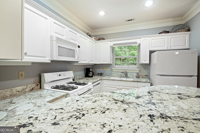 112 Gleneagle Ct Unit D202, Clayton, GA 30525 - kitchen with white appliances, ornamental molding, white cabinets, light stone countertops, and recessed lighting