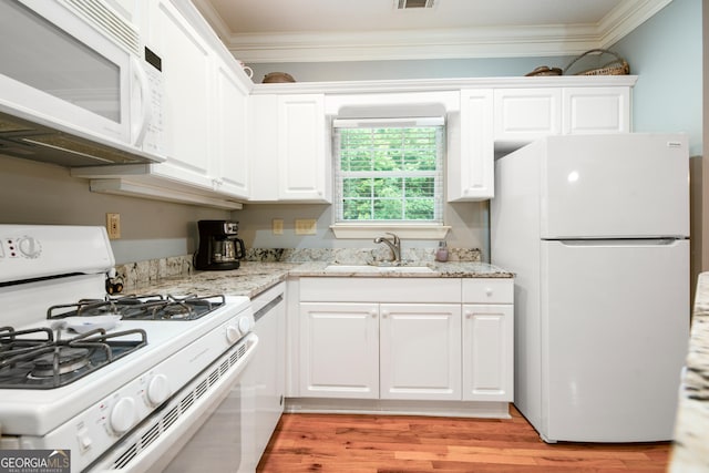 112 Gleneagle Ct Unit D202, Clayton, GA 30525 - kitchen with white appliances, ornamental molding, white cabinetry, light wood-type flooring, and light stone counters