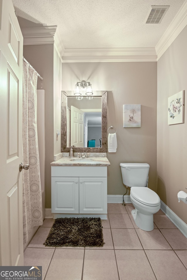 112 Gleneagle Ct Unit D202, Clayton, GA 30525 - full bathroom with ornamental molding, tile patterned flooring, vanity, a textured ceiling, and curtained shower