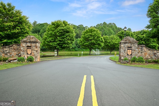 112 Gleneagle Ct Unit D202, Clayton, GA 30525 - view of asphalt road featuring street lights