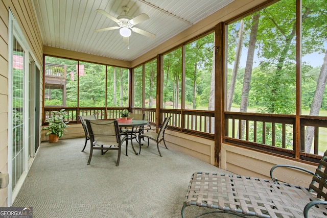 112 Gleneagle Ct Unit D202, Clayton, GA 30525 - sunroom with a ceiling fan and outdoor dining space