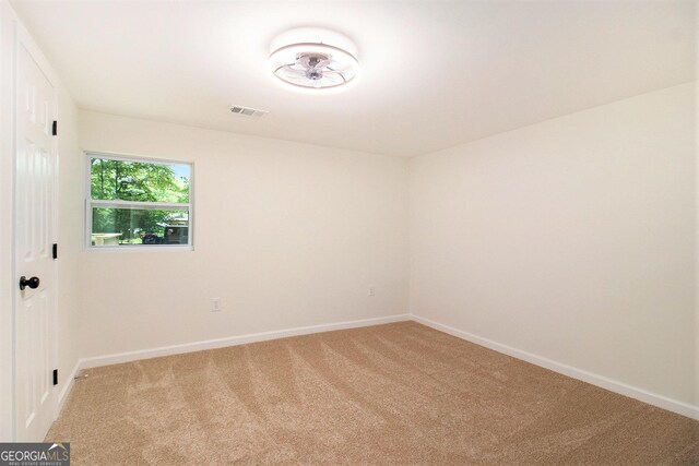 635 Layfield Dr, Pine Mountain, GA 31822 - empty room with light carpet and baseboards