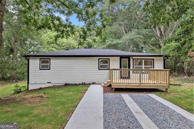 635 Layfield Dr, Pine Mountain, GA 31822 - ranch-style home featuring a deck, a front lawn, and a shingled roof