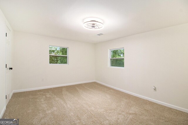 635 Layfield Dr, Pine Mountain, GA 31822 - spare room featuring light colored carpet and baseboards