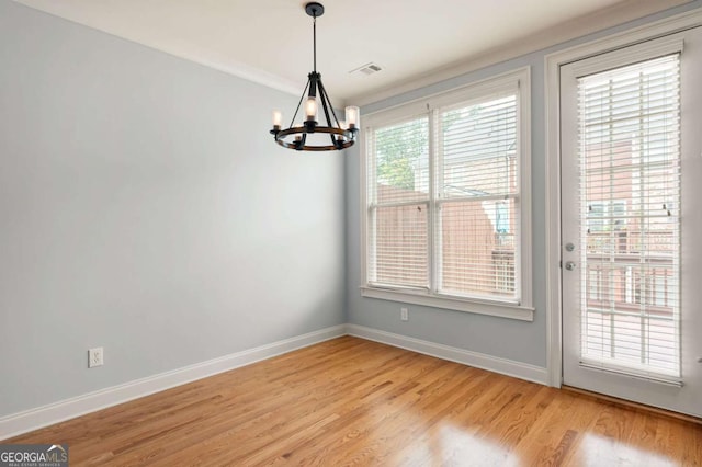 4503 Kendall Way, Roswell, GA 30075 - unfurnished dining area featuring a chandelier, light wood-style flooring, and baseboards