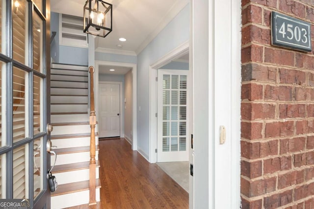 4503 Kendall Way, Roswell, GA 30075 - entrance foyer featuring stairway, wood finished floors, ornamental molding, baseboards, and a chandelier