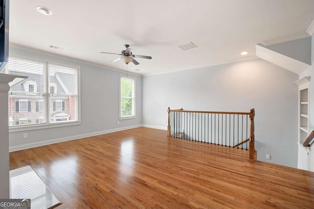 4503 Kendall Way, Roswell, GA 30075 - spare room featuring ceiling fan, wood finished floors, baseboards, recessed lighting, and ornamental molding