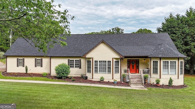 404 Carruth Rd, Winder, GA 30680 - view of front of property with a front yard and a shingled roof