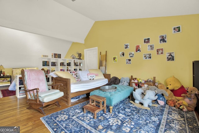404 Carruth Rd, Winder, GA 30680 - living area featuring wood finished floors and high vaulted ceiling