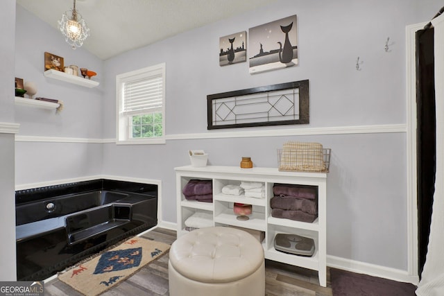 404 Carruth Rd, Winder, GA 30680 - living area featuring wood finished floors and baseboards