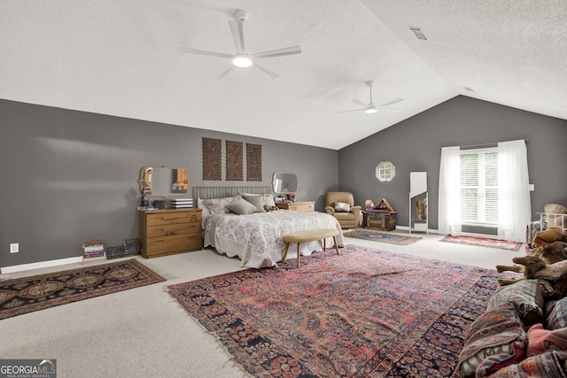 404 Carruth Rd, Winder, GA 30680 - bedroom featuring carpet floors, vaulted ceiling, a textured ceiling, ceiling fan, and baseboards
