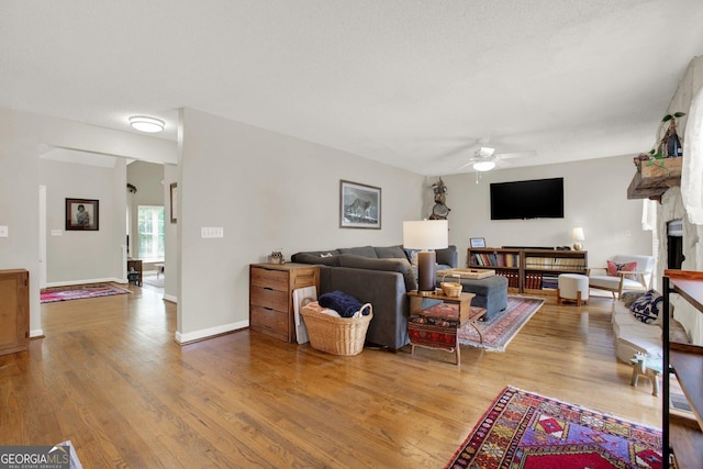 404 Carruth Rd, Winder, GA 30680 - living room with ceiling fan, wood finished floors, and baseboards