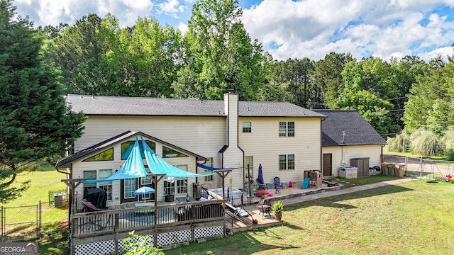 404 Carruth Rd, Winder, GA 30680 - rear view of house featuring a deck, a gate, a chimney, and central air condition unit