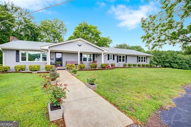 190 Roberts Way, Cornelia, GA 30531 - ranch-style house with a front yard, a chimney, and a porch