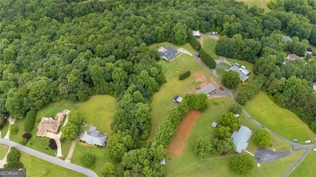 190 Roberts Way, Cornelia, GA 30531 - aerial view of property and surrounding area featuring a heavily wooded area