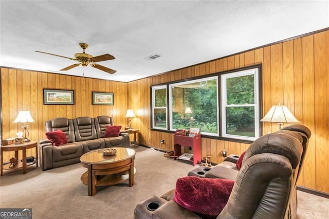 190 Roberts Way, Cornelia, GA 30531 - carpeted living room with ceiling fan and wood walls