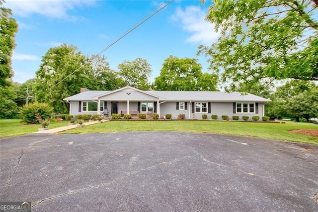 190 Roberts Way, Cornelia, GA 30531 - single story home with a front lawn, driveway, and a chimney