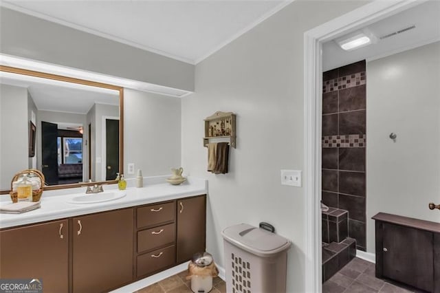 190 Roberts Way, Cornelia, GA 30531 - bathroom featuring vanity, tile patterned floors, tiled shower, and ornamental molding