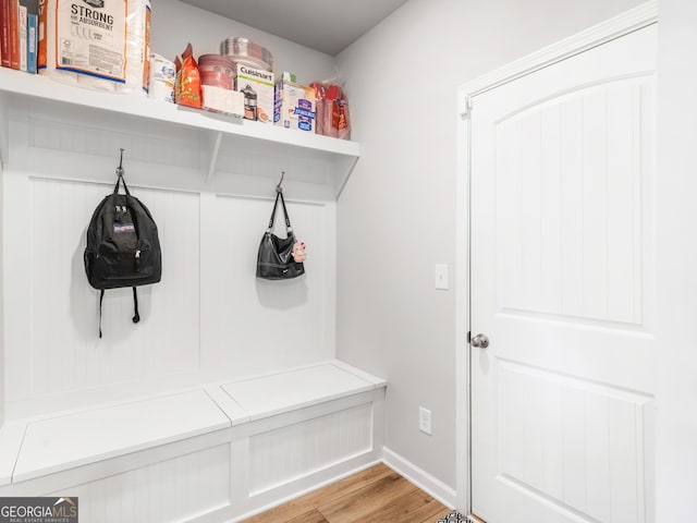 445 Sawmill Trce, Hampton, GA 30228 - mudroom with light wood-style floors and baseboards