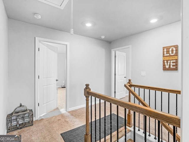 445 Sawmill Trce, Hampton, GA 30228 - hallway featuring an upstairs landing, light colored carpet, recessed lighting, and baseboards