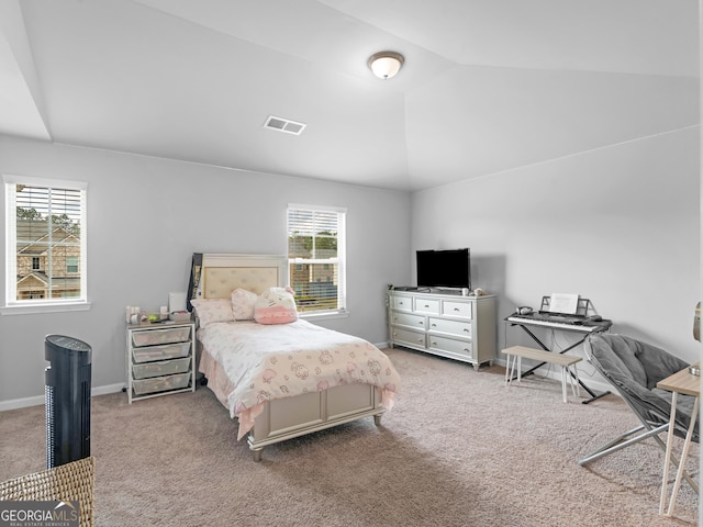 445 Sawmill Trce, Hampton, GA 30228 - carpeted bedroom featuring lofted ceiling and baseboards
