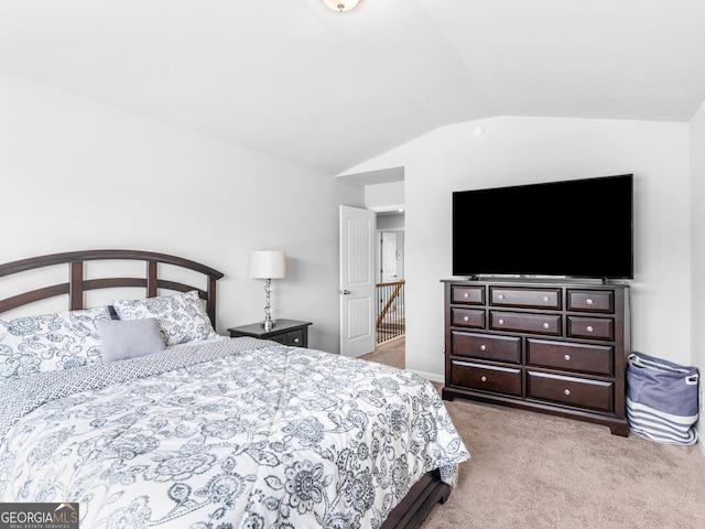 445 Sawmill Trce, Hampton, GA 30228 - bedroom featuring carpet flooring and vaulted ceiling