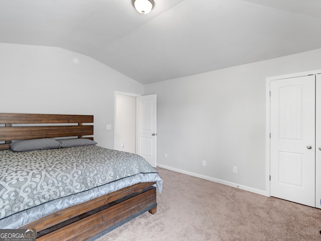 445 Sawmill Trce, Hampton, GA 30228 - bedroom featuring lofted ceiling, carpet flooring, and baseboards
