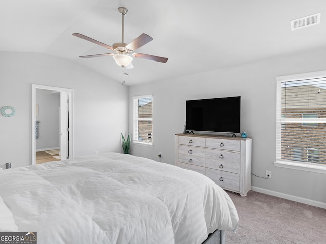 445 Sawmill Trce, Hampton, GA 30228 - bedroom featuring lofted ceiling, baseboards, a ceiling fan, and light colored carpet
