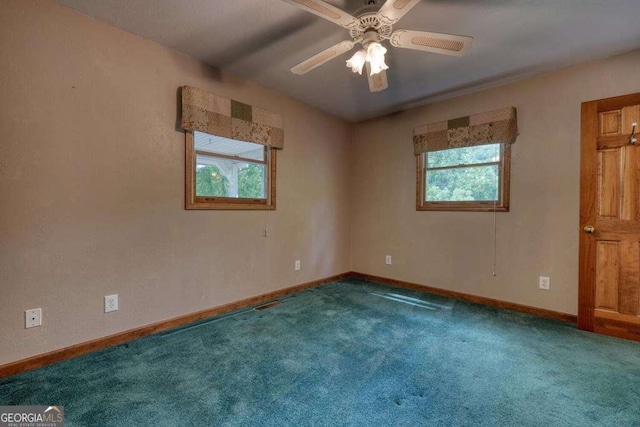 2309 Ridgecrest Cir, Hiawassee, GA 30546 - carpeted spare room with baseboards and ceiling fan