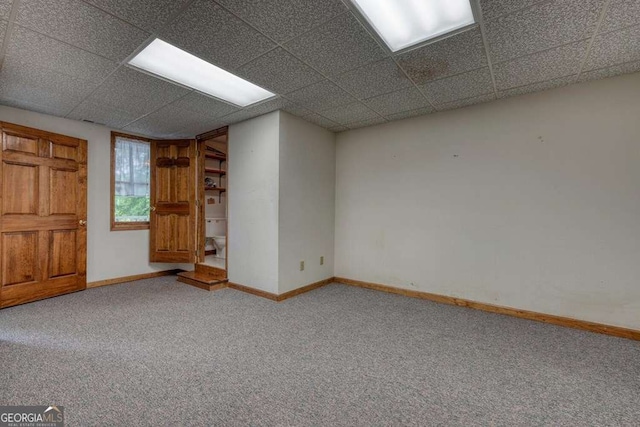2309 Ridgecrest Cir, Hiawassee, GA 30546 - unfurnished room with carpet, baseboards, and a paneled ceiling