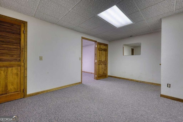 2309 Ridgecrest Cir, Hiawassee, GA 30546 - spare room featuring carpet flooring, a drop ceiling, and baseboards