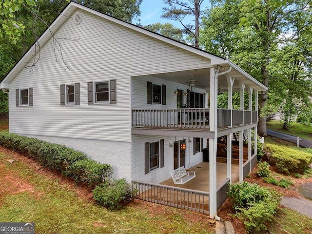 2309 Ridgecrest Cir, Hiawassee, GA 30546 - view of home's exterior with a balcony and a patio