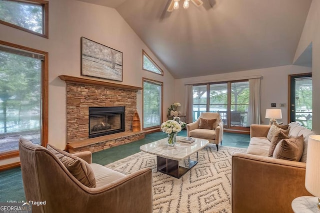 2309 Ridgecrest Cir, Hiawassee, GA 30546 - carpeted living area with high vaulted ceiling, a ceiling fan, and a stone fireplace