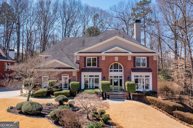 3410 Kates Way, Duluth, GA 30097 - view of front facade with a chimney and brick siding