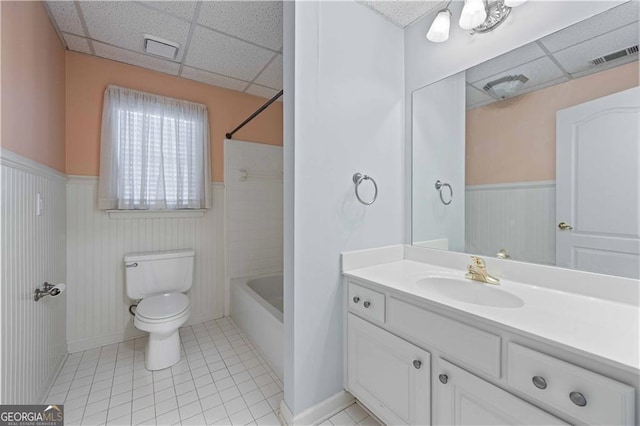 3410 Kates Way, Duluth, GA 30097 - full bath with a paneled ceiling, vanity, wainscoting, toilet, and tile patterned floors
