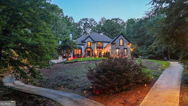 2878 Heather Row Rdg SW, Lilburn, GA 30047 - french country style house with stone siding