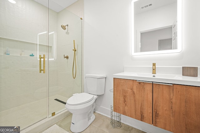 2878 Heather Row Rdg SW, Lilburn, GA 30047 - full bathroom featuring toilet, vanity, a shower stall, baseboards, and tile patterned floors