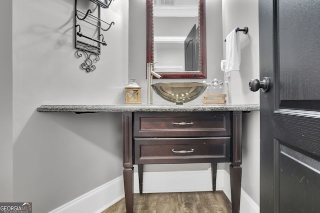 285 Finsbury Park Ct, Suwanee, GA 30024 - bathroom with wood finished floors and vanity
