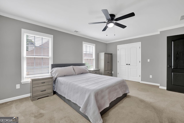 285 Finsbury Park Ct, Suwanee, GA 30024 - bedroom featuring crown molding, light colored carpet, multiple windows, ceiling fan, and a closet